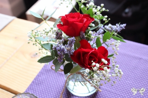 Red, purple and white jam jar flowers- Elizabeth Weddings
