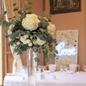 Tall floral centrepieces at Orchardleigh, styling by Elizabeth Weddings