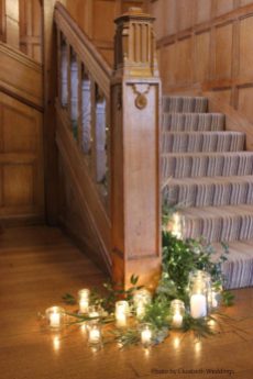 Candles and foliage at Coombe Lodge, styling by Elizabeth Weddings