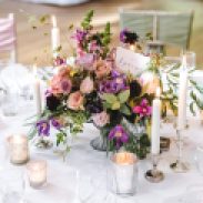 Pink and purple urn centrepiece, styling by Elizabeth Weddings